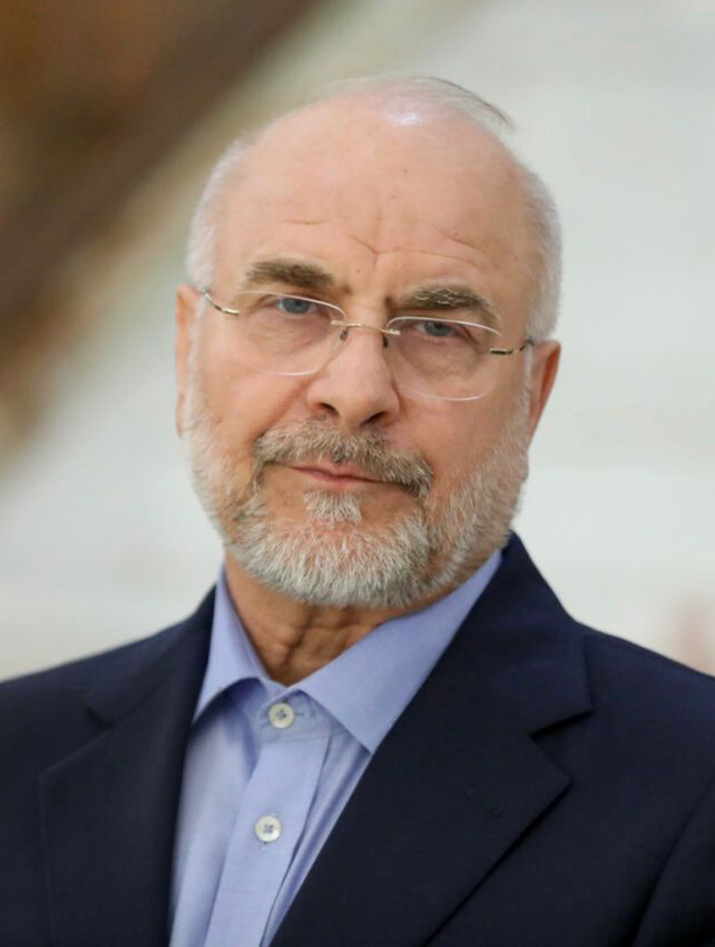 Iran's parliament speaker Ghalibaf re-elected, cementing conservative rule.